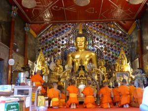 Chanting to the Buddha in the temple